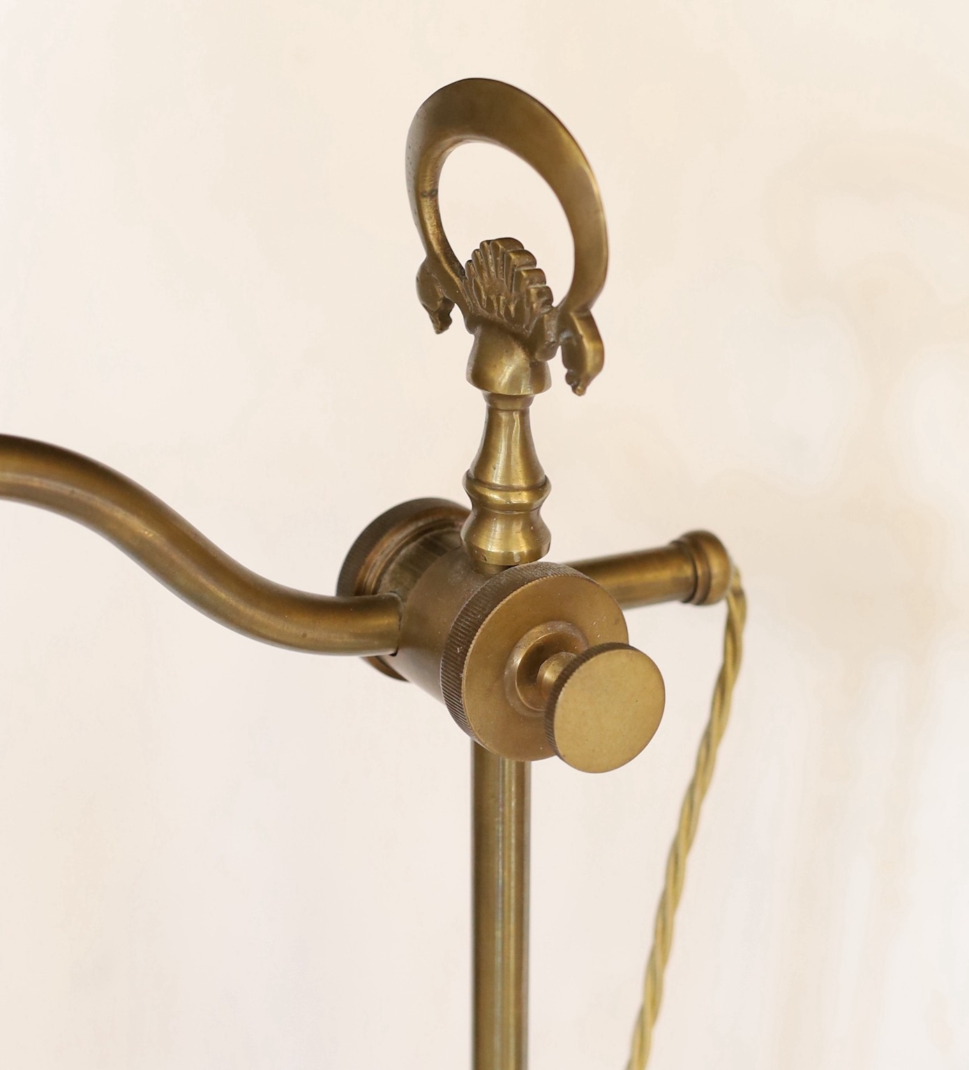 A pair of Edwardian style brass desk lamps with loetz style glass shades, height 61cm